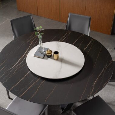 Modern luxury round ceramic dining table with a durable sintered stone surface and elegant base