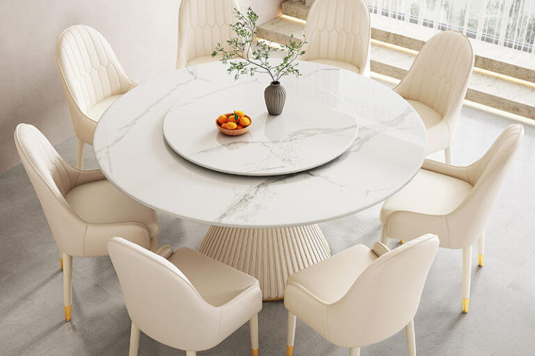 minimalist round ceramic dining table with sintered stone top
