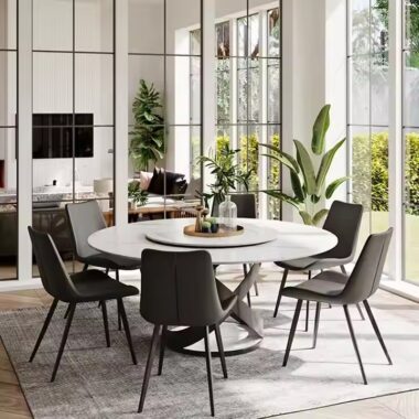 minimalist round ceramic dining table with sintered stone top