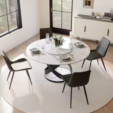 minimalist round ceramic dining table with sintered stone top