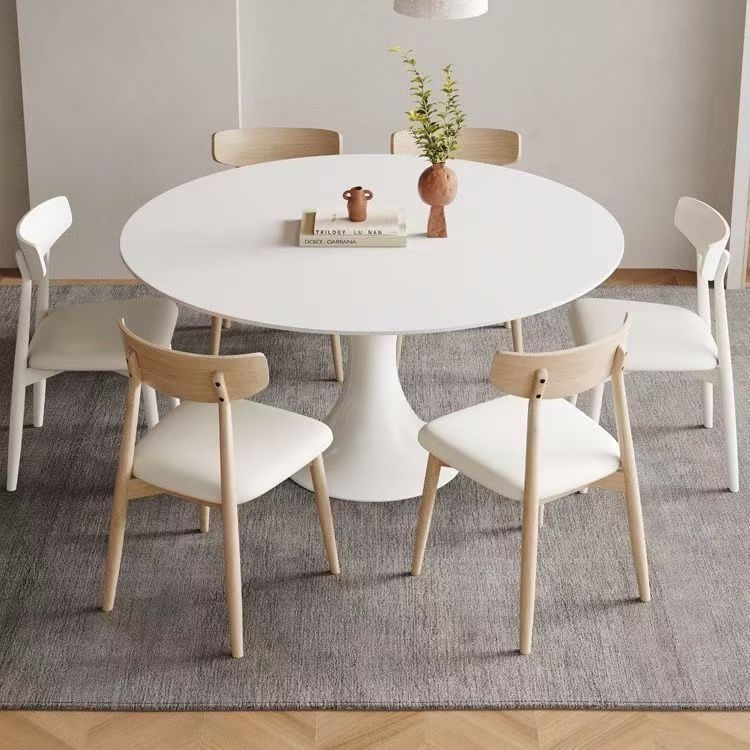 Modern cream-style white round ceramic dining table for homes