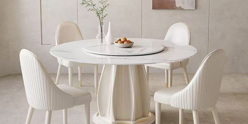 cream-style round ceramic dining table for modern homes